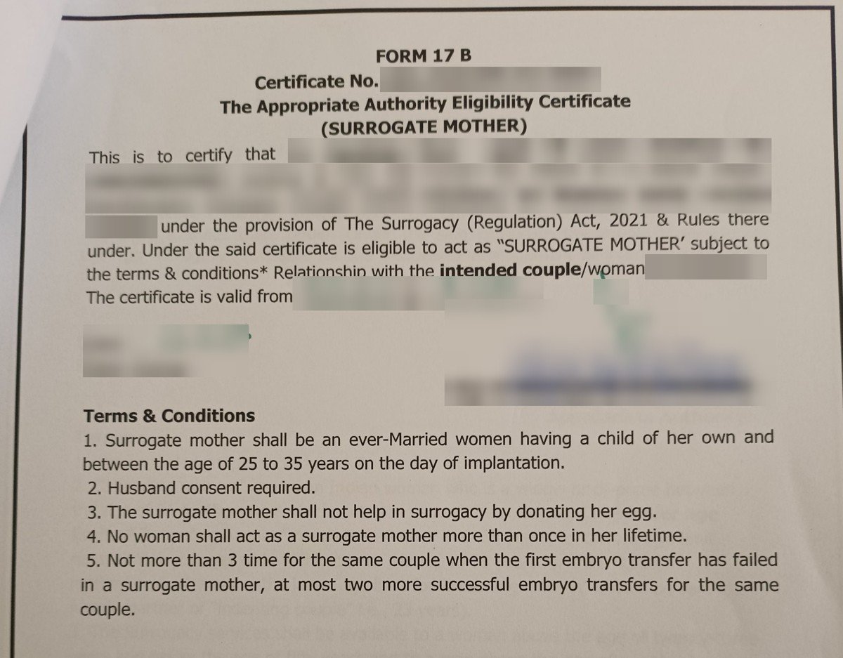 Form 17B Eligibility Certificate for the surrogate mother with personal details blurred, and the terms visible.