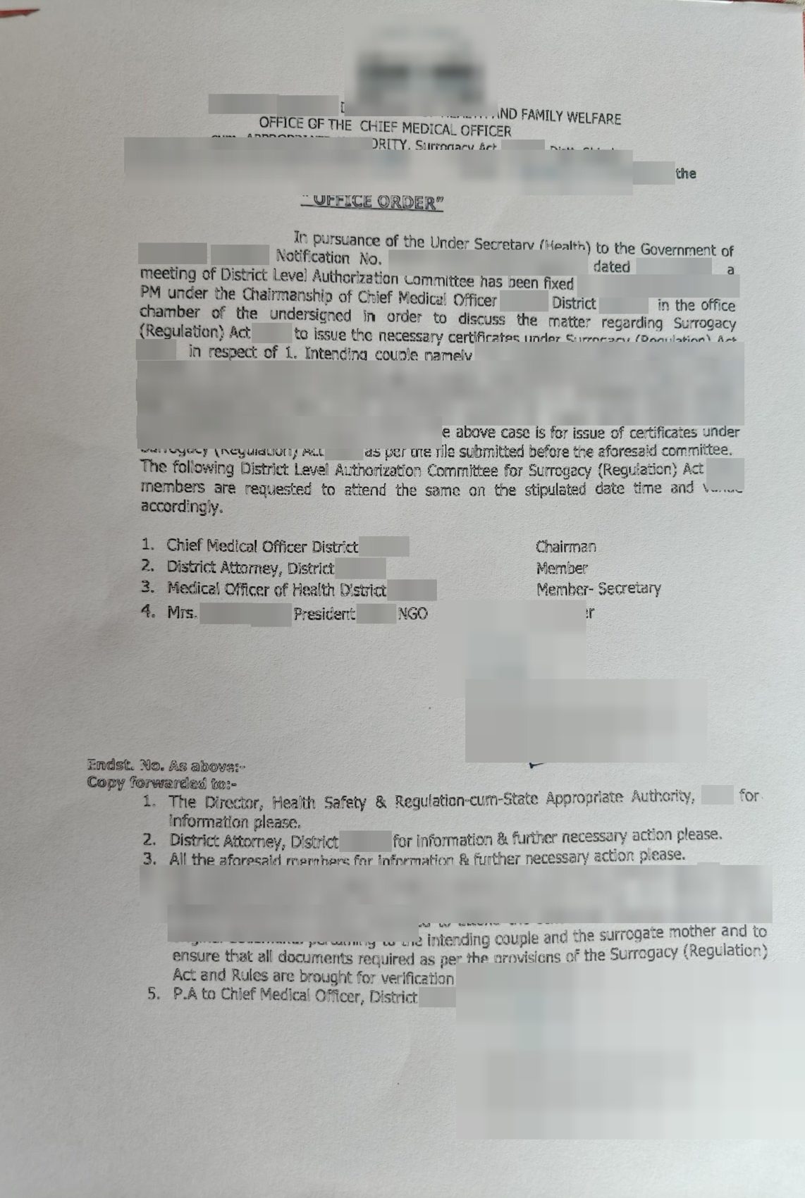 Office order from the Chief Medical Officer fixing the District Level Authorization Committee meeting. Names, places, dates and numbers are hidden.